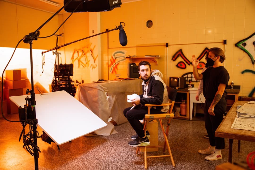 Behind the scenes photo 63 from Clone Cops production showing 1st ad nate eggert sitting in for a lighting rehearsal